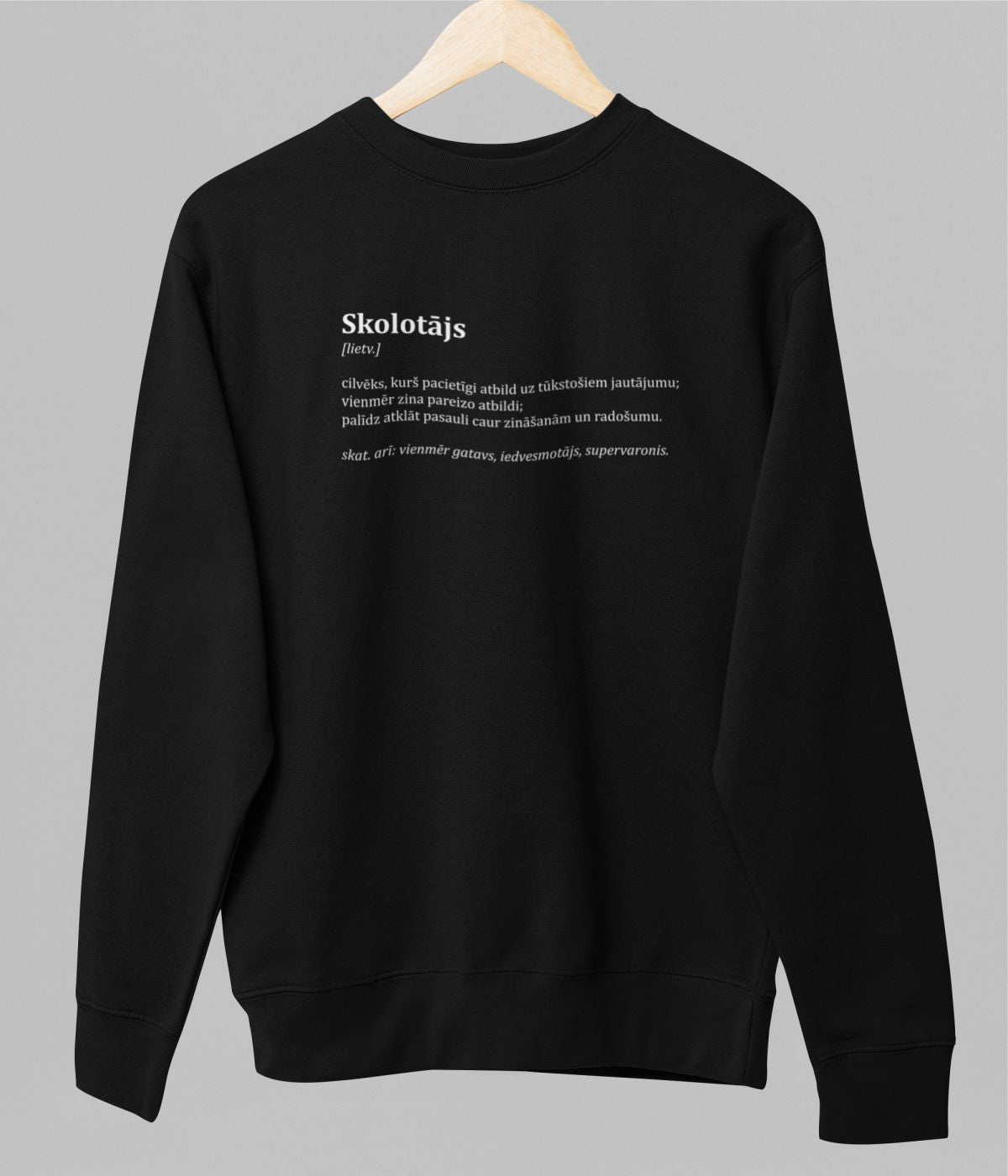 Melns UNISEX džemperis bez kapuces "Skolotāja apraksts"